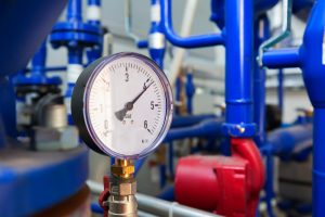 Close up of pressure meter of a pressurized air tank