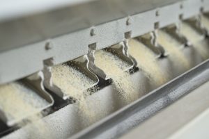 bulk product moving through a vessel