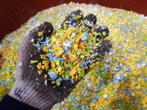 hand in hopper with material experiencing problems